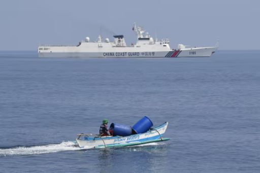 The Philippines condemns China for installing floating barrier in disputed South China Sea