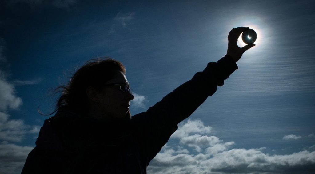 Why some clouds vanish during solar eclipses