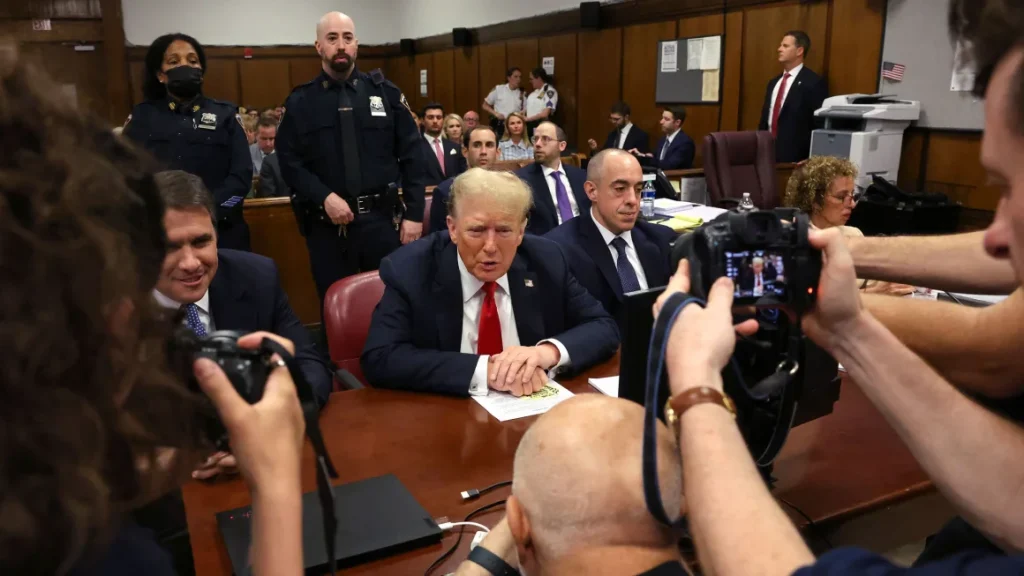 Donald Trump appears in court with his lawyers Todd Blanche