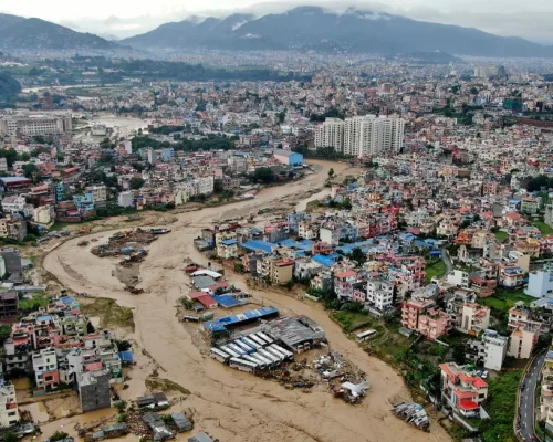 Rescuers use zip lines and boats to reach survivors as Nepal flooding and landslides kill nearly 200 people