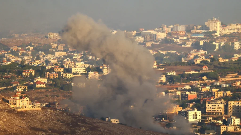 Smoke billows from the site of an Israeli airstrike on the outskirts