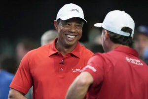 Tiger Woods’ son Charlie chuckles while watching his dad suffer heavy defeat in TGL debut