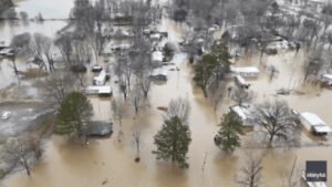 Frigid cold is moving across the US, including areas still recovering from deadly flooding