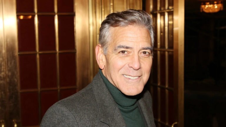 George Clooney is farming and driving a tractor. Seriously