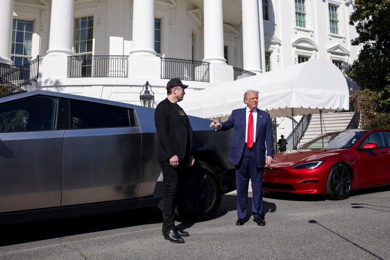 As Trump poses with Teslas in front of the White House, the company’s slumping stock climbs